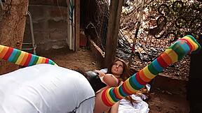 Latina babe uses dildo on her pussy outdoors