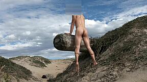 Teasing cock at public beach, cumming in open plaza. Dare to watch?