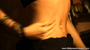 Beautiful nude bollywood chick teases with intense undressing and erotic dancing