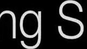 pretty young woman relaxes alone by gently touching herself in a private moment. she uses a dildo to ease the itch