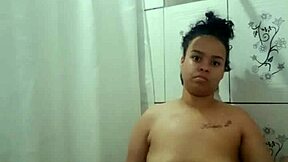 Showering Latina teen fingers herself with pure lust