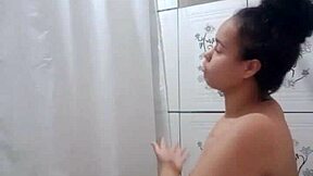 Showering Latina teen fingers herself with pure lust