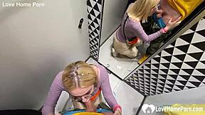 gf gives a blowjob in the changing booth