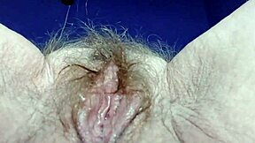 German granny fucks hairy pussy and ass with cucumber in raw action.