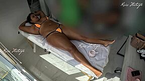 Tanned Amateur With Big Pussy Gets Massage In Micro Bikini Stuffed Inside