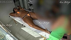 Tanned Amateur With Big Pussy Gets Massage In Micro Bikini Stuffed Inside