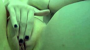 Sexy Nadia enjoys a playful bath with rubber duckies