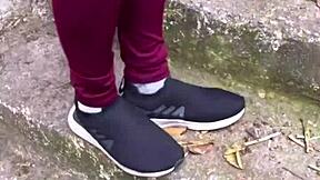 pretty girl with brown eyes climbing the street hill excitedly