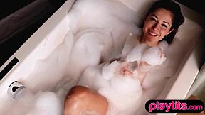 Petite Ukrainian milf reveals bubble butt in bathtub