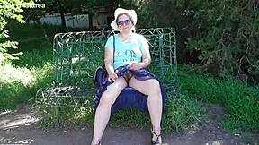 Chubby Hairy Mature Woman in Transparent Dress Exposes Her Beaver in Public Outdoor Setting