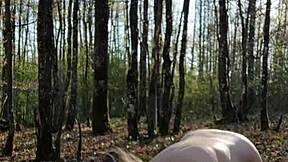 Blonde slave bent over for outdoor humiliation session in 2025.