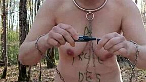 Blonde slave bent over for outdoor humiliation session in 2025.