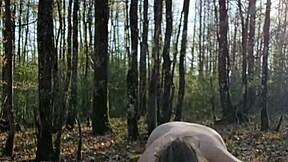 Blonde slave bent over for outdoor humiliation session in 2025.