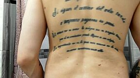 Muscular tattooed man moans during bareback sex with big natural tits outdoors