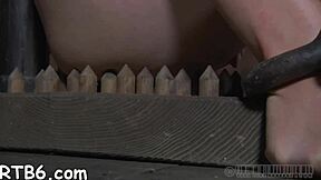 Roughly tormenting babe's wet pussy with a toy.