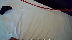 Sofi bound and gagged with red ropes on bed pov
