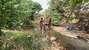 curvy ebony flashing outdoors, ready for devouring at the stream