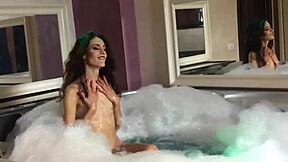 does the pretty skinny teen 18+ masturbate while bathing on webcam?