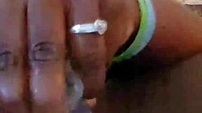 Ebony wife self-pleases her ass in amateur video.