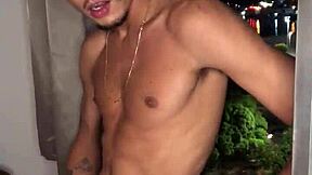 Naughty boy jerks off at the building window with tattoos