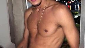 Naughty boy jerks off at the building window with tattoos