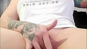 redhead rubs wet clit to orgasm watching porn