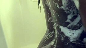 Horny black model rides glass dildo and plays with wet pussy