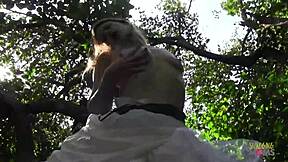 blonde climbs tree for solo outdoor masturbation session