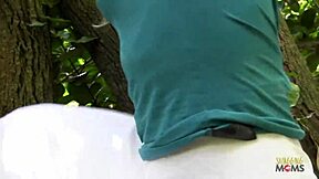 blonde climbs tree for solo outdoor masturbation session