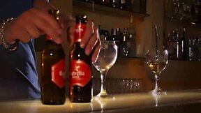 beautiful woman with brown eyes gets intimate in bar