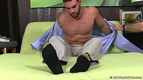 hunk savors every lick on his bare feet fetish style