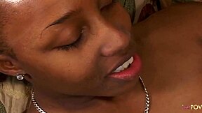 The lesbian couple, eyes filled with love, starts with kissing and explores with strapon