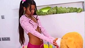 Little Lupe, latina teen 18+, fingers her small tits in solo masturbation.