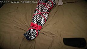 Tied girl cums from a vibrator. Is she enjoying the bondage?