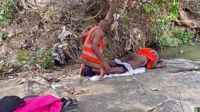 Worshiping a huge fat ass outdoors. Homemade action with big tits bouncing in the open air.