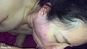 Asian Milf Fluffing Cock On Webcam!