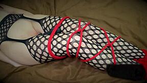 Tied girl cums from a vibrator. Is she enjoying the bondage?