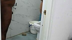 wetandpissy rubbing her big tits in a pool of piss