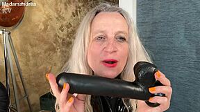 In a latex corset, I'm watching wild prolapse fisting with a mega dildo. It's intense!