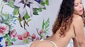 beautiful naughty young girl rubbing her pussy with a pillow.