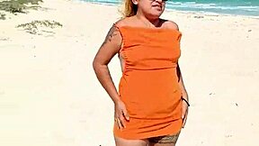 mexican puta flashing thong and tits on public beach