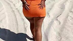 mexican puta flashing thong and tits on public beach