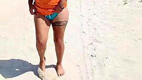 mexican puta flashing thong and tits on public beach