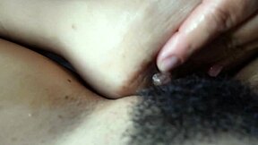 Curvy girl masturbates her meaty hairy pussy intensely.