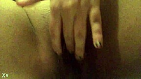 MILF Masturbating Herself Deliciously in Bedroom