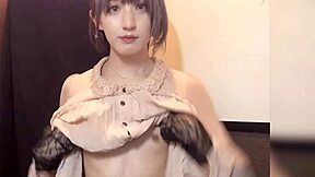 beautiful asian ladyboy in crossdressing teases nipples during quiet masturbation