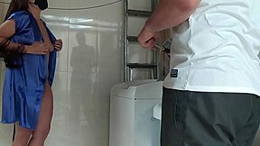 Housewife teases the repair tech fixing her washing machine with flirty moves