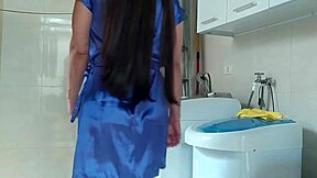 Housewife teases the repair tech fixing her washing machine with flirty moves