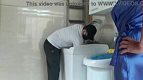 Housewife teases the repair tech fixing her washing machine with flirty moves