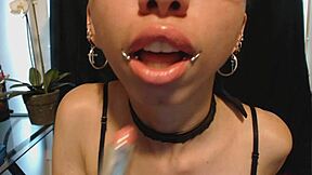 putting on nude colored lipstick and drooling all over it